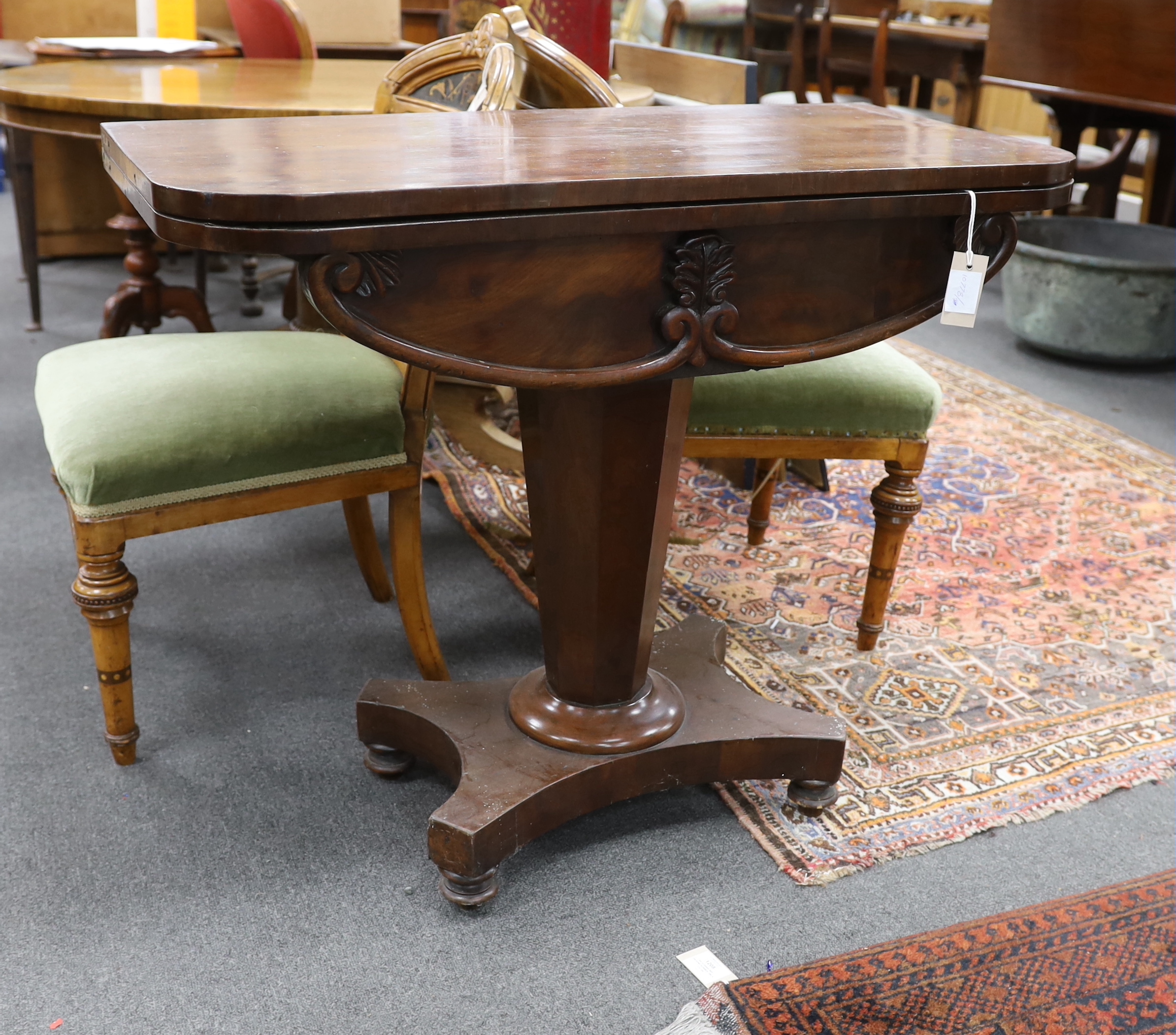 An early Victorian mahogany rectangular folding card table, width 91cm, depth 45cm, height 76cm